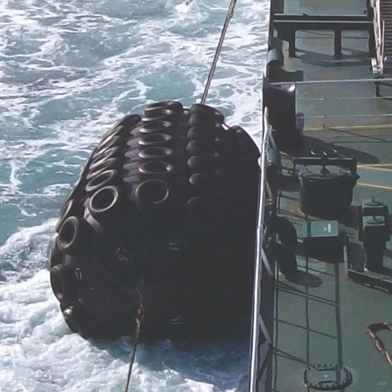 Pneumatic Yokohama fenders rigged to vessel