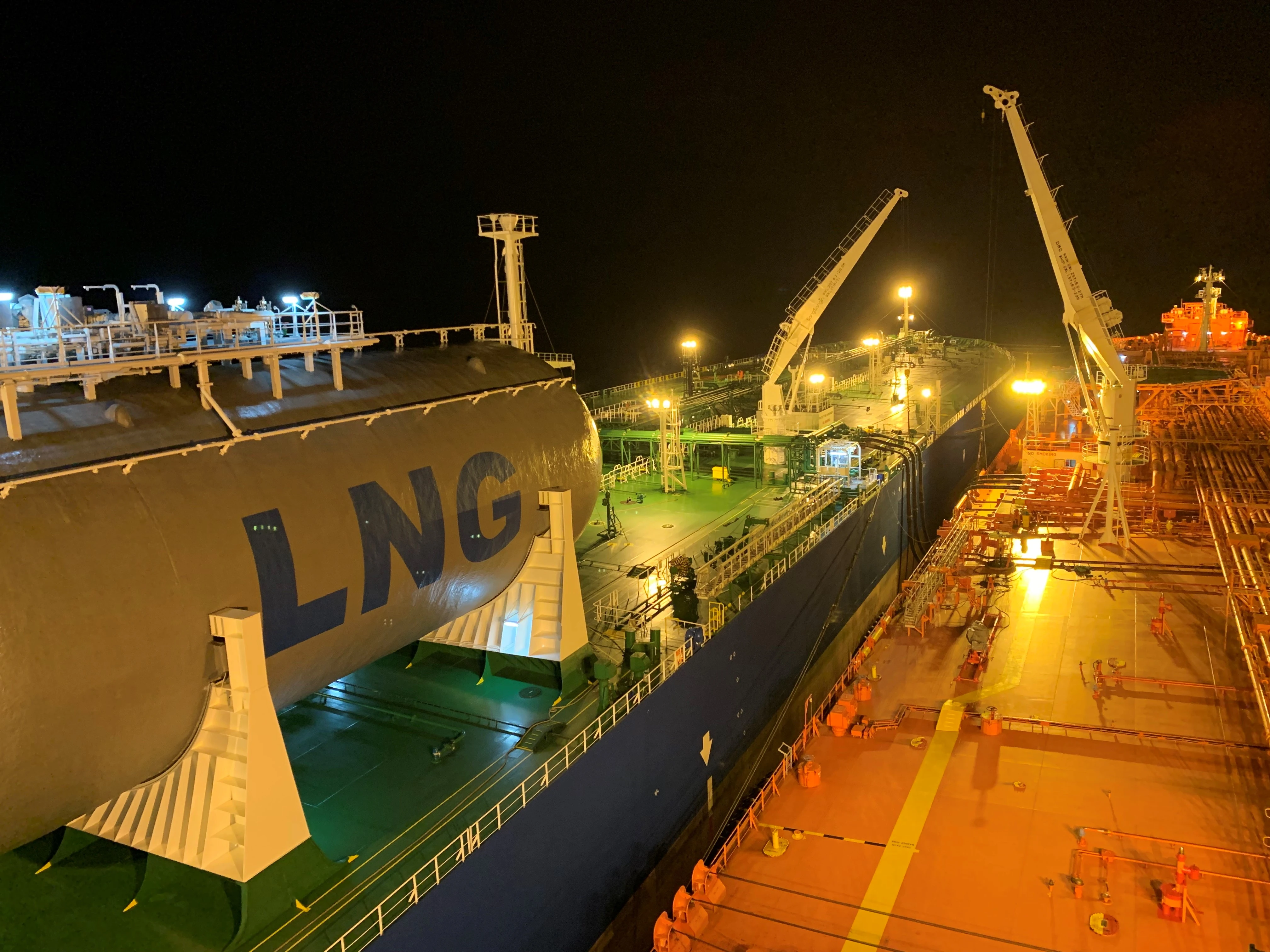 LNG STS transfer at night