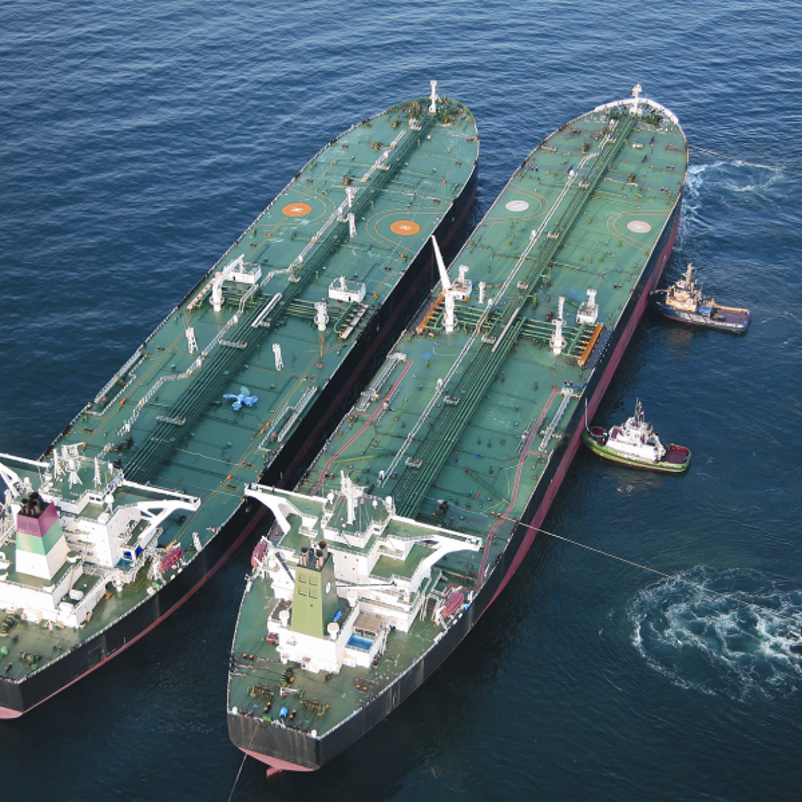 STS transfer at anchor with support boats