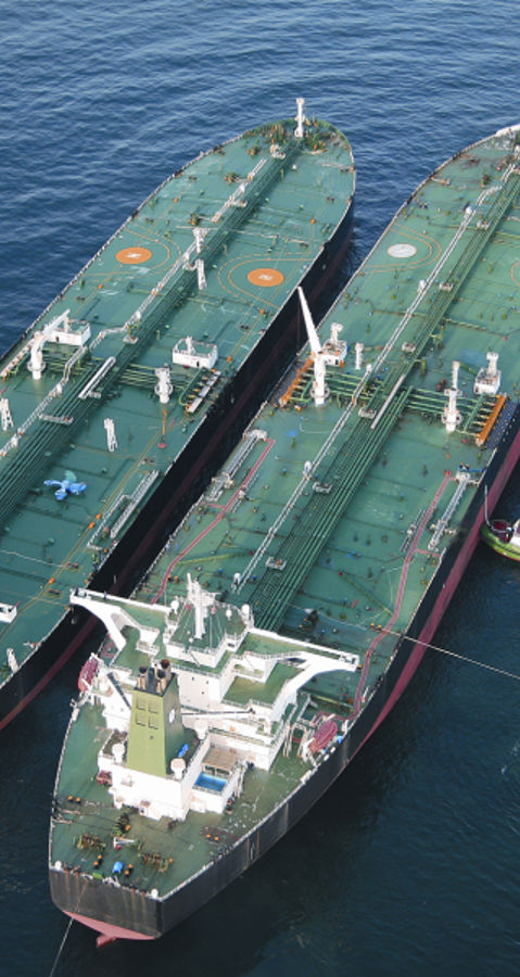 STS transfer at anchor with support boats