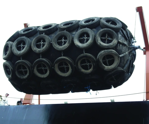 Yokohama pneumatic fenders with tyre net protection on fender davit